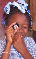 Haiti girl with loupe