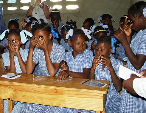 Haiti girls closeup with loupes