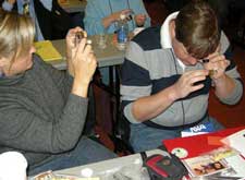 NSTA participant using a Private Eye jeweler's loupe.